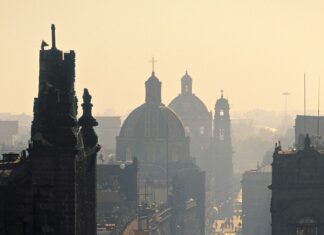 The street in Mexico City shows historic buildings and people walking with domes in the background, HD Mobile Wallpaper