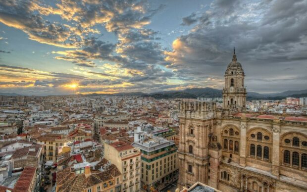 The historic cityscape of Spain shows beautiful architecture and a sunset sky with Spain wallpapers, HD Desktop Wallpaper
