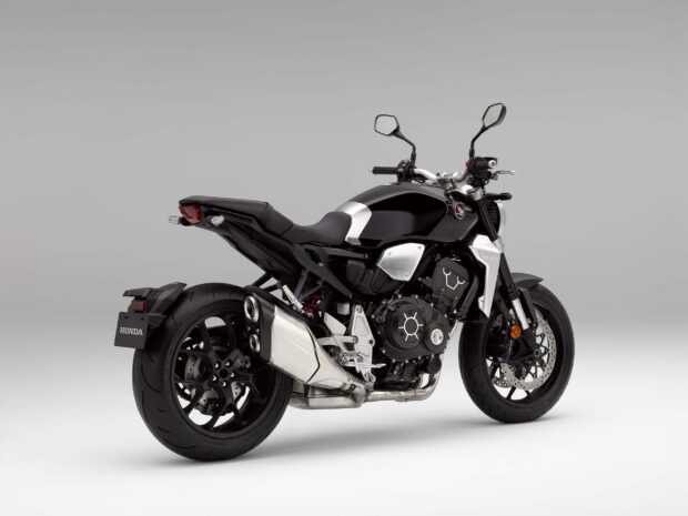 A sleek black Honda Cb1000R motorcycle is shown from the side on a gray background, 2K Desktop Wallpaper