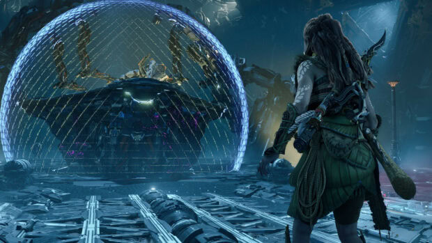 Aloy faces a large machine protected by a glowing energy shield in Horizon Forbidden West