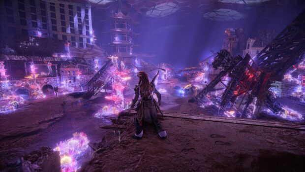 A Horizon Forbidden West character exploring a glowing ancient city ruins with futuristic structures