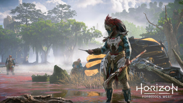 A skilled warrior from Horizon Forbidden West stands in a misty swamp surrounded by trees and ancient machinery