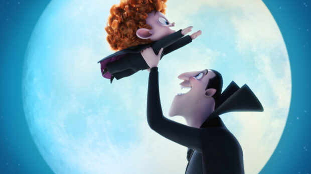 A Hotel Transylvania character holding up a red haired child against the full moon background