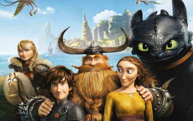 The How To Train Your Dragon characters are posing together with a scenic island background