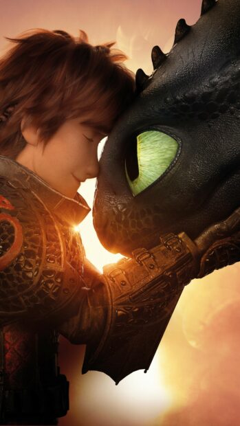 Hiccup gently touching the dragon in a close moment from How To Train Your Dragon