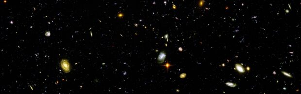 A vast collection of galaxies captured in Hubble Deep Field showing distant cosmic structures