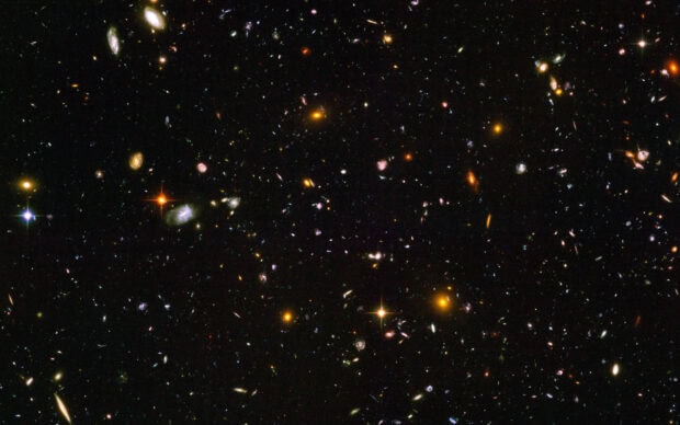 A vast view of galaxies captured in Hubble Deep Field showing deep space objects in high definition