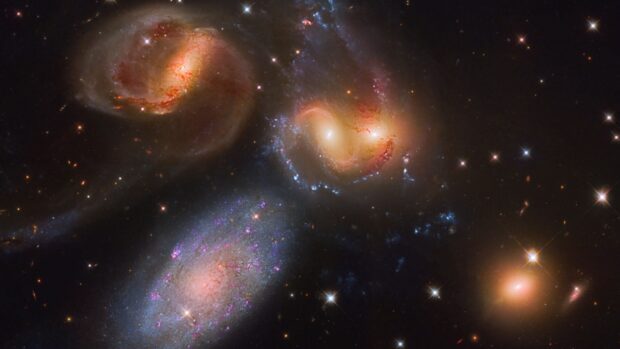 Spiral galaxies and star clusters captured in the Hubble Deep Field galaxy