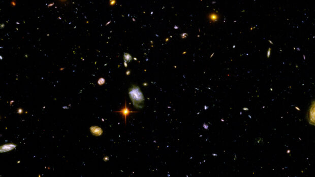 A stunning deep field universe showing countless galaxies in the distant space