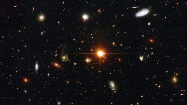 A stunning high definition view of the hubble deep field showcasing countless distant galaxies and stars
