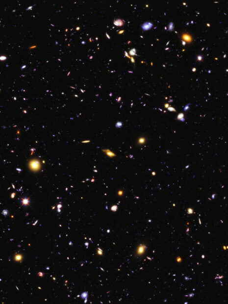 A deep view of distant galaxies in space captured by Hubble revealing cosmic structures