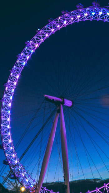 The London Eye is glowing with purple lights against the evening sky, London Eye Wallpapers, 4K Phone Wallpaper