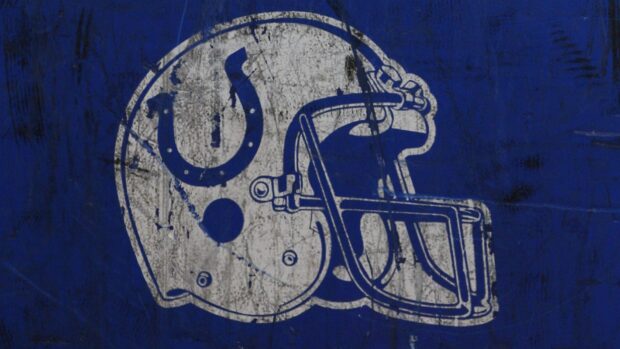 A grungy Indianapolis Colts helmet graphic on a blue textured background