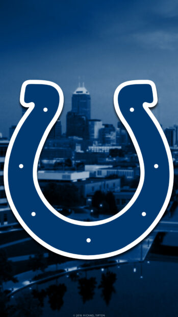 Indianapolis Colts logo with city skyline in the background