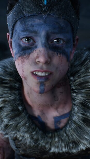 A close up of a warrior with blue war paint and fur collar from Hellblade wallpapers, HD Phone Wallpaper