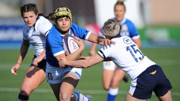 A rugby league player in blue evades a tackle during an intense game, 4K Desktop Wallpaper