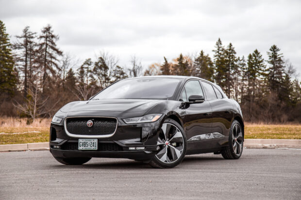 The Jaguar I Pace is parked outside with trees in the background on an overcast day, HD Desktop Wallpaper