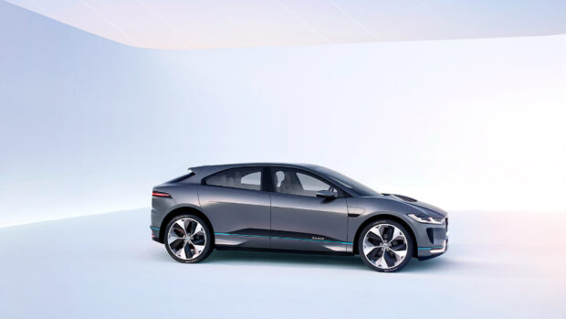 A gray Jaguar I Pace is shown in a minimalist studio setting, HD Desktop Wallpaper