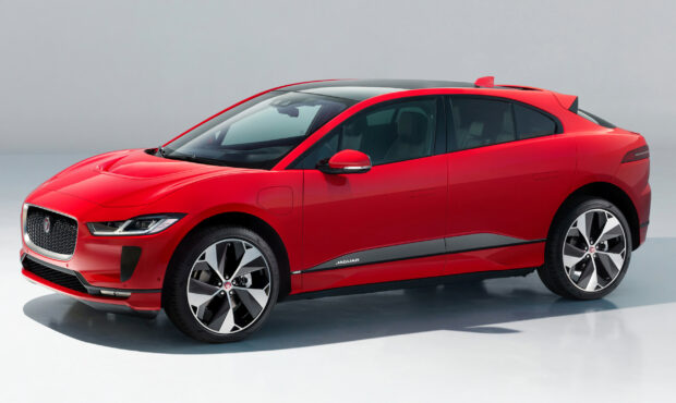 A red Jaguar I Pace electric car is shown in a side view on a white background, 2K Desktop Wallpaper