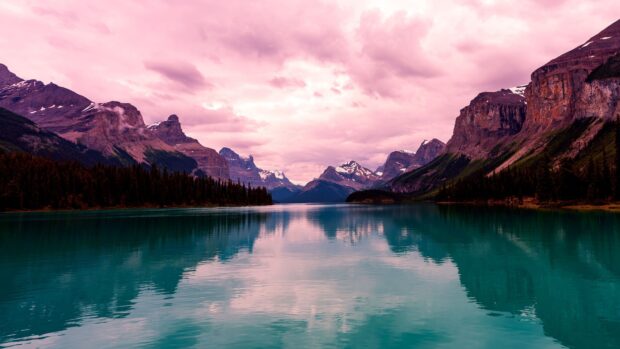 Mountain range and lake landscape of Jasper National Park at sunset