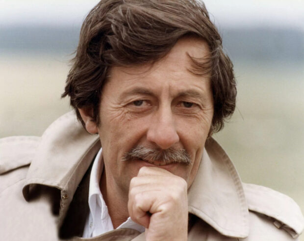 A close up of Jean Rochefort with a mustache and beige trench coat, HD Desktop Wallpaper