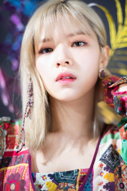 A close up portrait of Jeongyeon Twice with blonde hair and colorful clothing, 2K Mobile Wallpaper