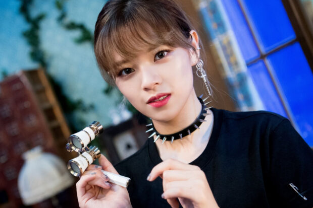 Jeongyeon Twice holding a small vintage telescope with a spiked choker and earrings in a cozy room, HD Desktop Wallpaper