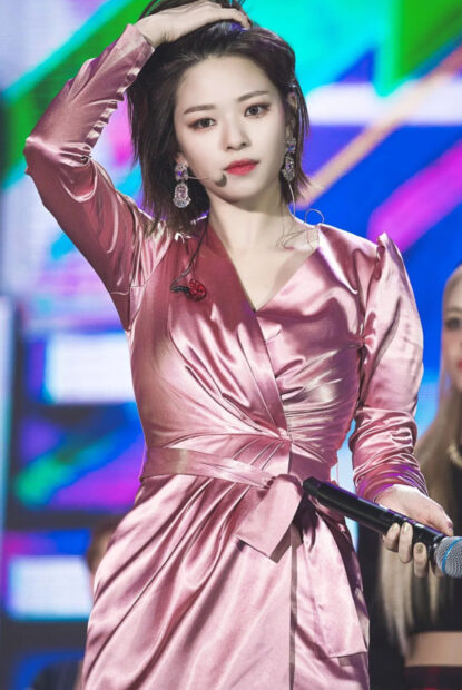 Jeongyeon Twice performs on stage wearing a pink satin dress and holding a microphone, HD Mobile Wallpaper