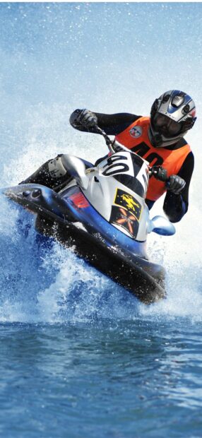 A rider on a jet ski speeding through water with splashes and waves around, HD Phone Wallpaper