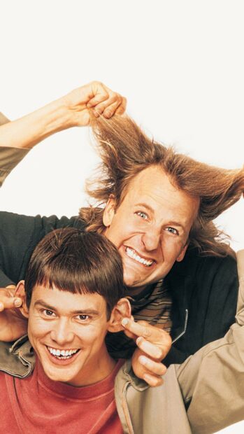 Jim Carrey pulls a funny face while holding a friend's ears and hair, 2K Mobile Wallpaper