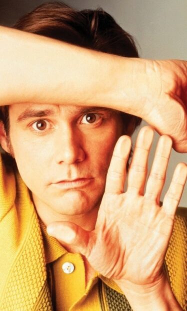 Jim Carrey wallpapers showing a serious expression with hand gestures, HD Phone Wallpaper