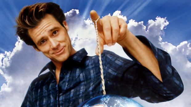 Jim Carrey holding a globe with string against a cloudy sky in Jim Carrey wallpapers, HD Desktop Wallpaper