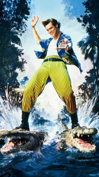 Jim Carrey confidently balances on two crocodiles in a jungle setting, 2K Phone Wallpaper