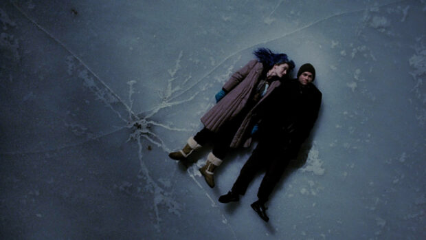The scene shows Jim Carrey and a woman lying on cracked ice, Jim Carrey Wallpapers, HD Desktop Wallpaper