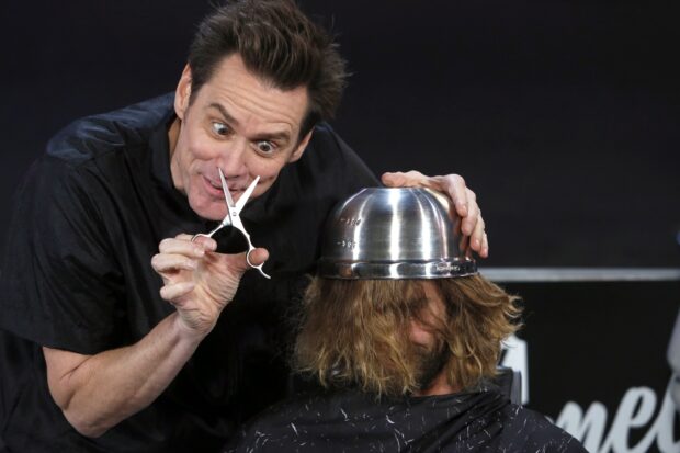 Jim Carrey wallpapers show a playful haircut moment with scissors and a bowl, 2K Desktop Wallpaper