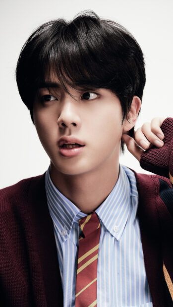 Jin BTS Wallpapers showing a close up of Jin wearing a striped shirt and tie, 4K Phone Wallpaper