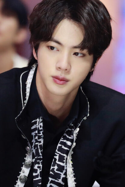 Jin BTS wallpapers shows a close up of Jin wearing a detailed black and silver outfit, HD Mobile Wallpaper