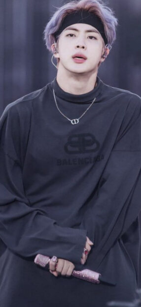 Jin BTS with purple hair wearing a black Balenciaga shirt holding a pink mic, HD Mobile Wallpaper