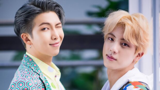 Jin and RM from BTS posing together in colorful outfits, 4K Desktop Wallpaper