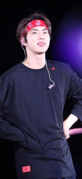 Jin Bts wears a red bandana and black shirt during a live performance, HD Mobile Wallpaper