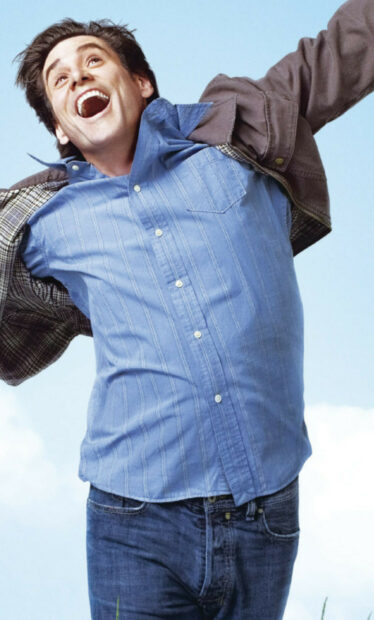 Jim Carrey is smiling widely wearing a blue shirt and jacket, HD Phone Wallpaper