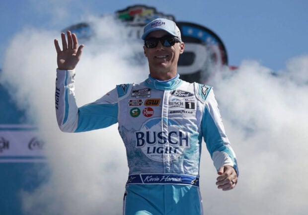 Kevin Harvick is waving and smiling in his racing suit after a race, HD Desktop Wallpaper