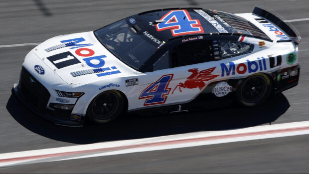 A white and black race car driven by Kevin Harvick on the track, 2K Desktop Wallpaper