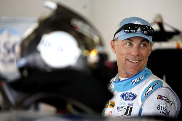 Kevin Harvick is smiling while wearing his racing suit and cap, HD Desktop Wallpaper