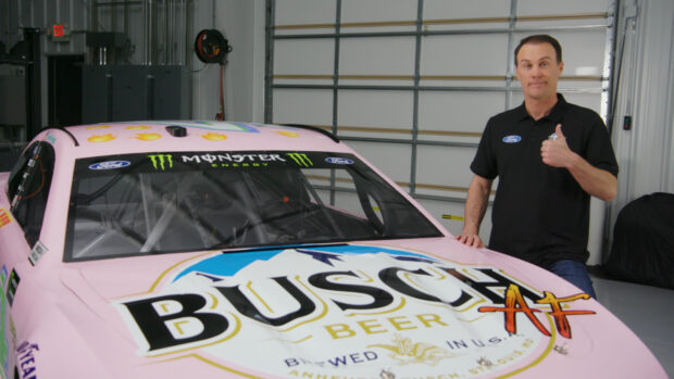 Kevin Harvick standing next to a Busch Beer race car giving a thumbs up, 4K Desktop Wallpaper