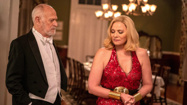 Kim Cattrall in a red dress with a man in formal wear in an elegant room, 4K Desktop Wallpaper