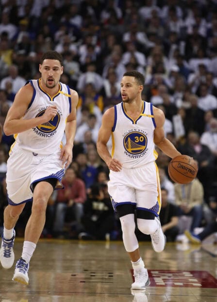 Klay Thompson is running alongside Stephen Curry during a game, 2K Mobile Wallpaper