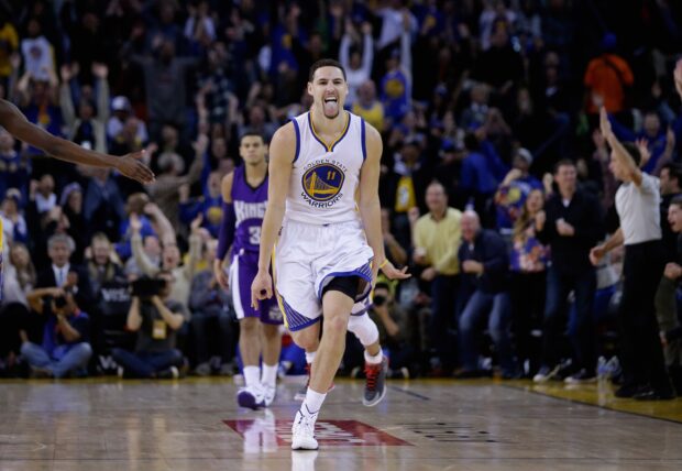 Klay Thompson celebrates with excitement after scoring in the basketball game, 2K Desktop Wallpaper