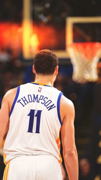 Klay Thompson is seen wearing his jersey during a basketball game, HD Phone Wallpaper