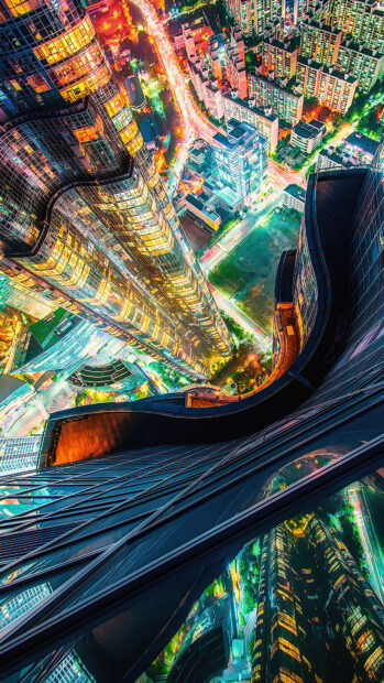 Vibrant korea cityscape at night with illuminated skyscrapers and busy streets from above
